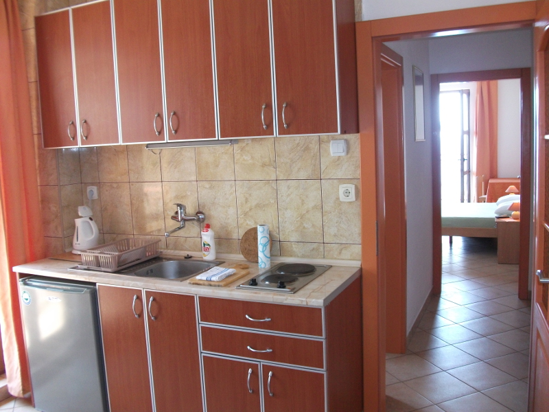 Here you can see the whole apartment from the kitchen, over the hall to the bedroom with the balcony in front.